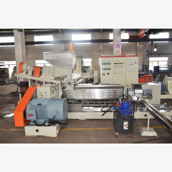 Internal refining double stage extrusion granulation hot cutting unit